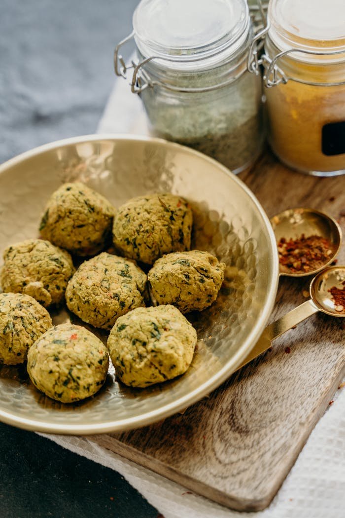 Services Delicious homemade falafel balls served in a rustic setting with rich spices.